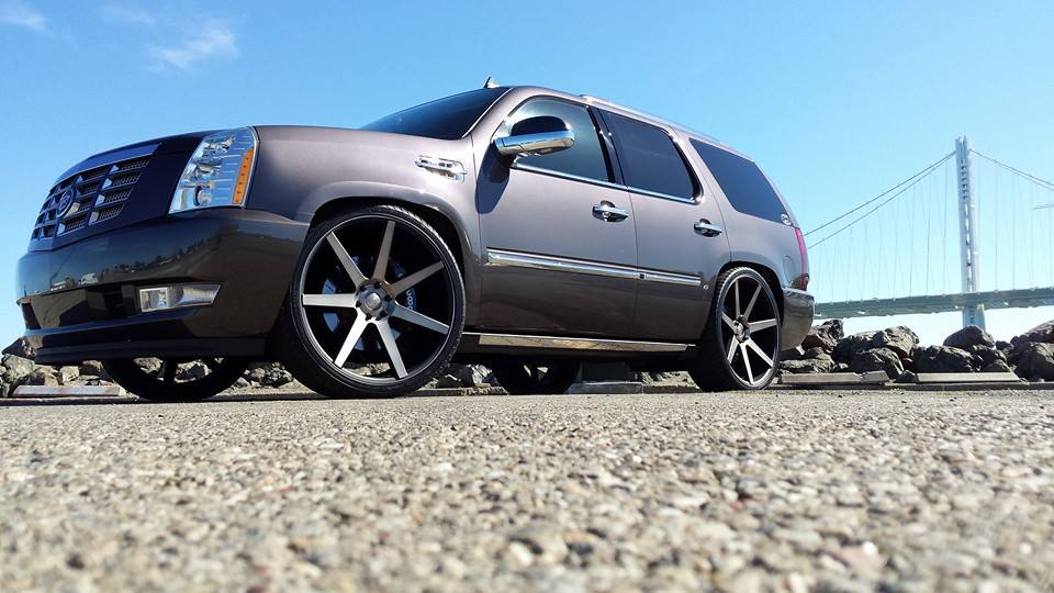 My dropped escalade on 16" wilwoods and 26s.